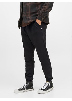 Jack&Jones Spodnie dresowe Gordon 12249274 Czarny Regular Fit ze sklepu MODIVO w kategorii Spodnie męskie - zdjęcie 181074939