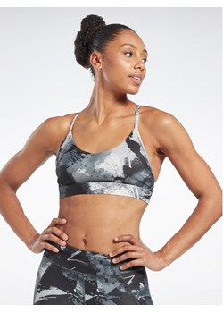 Reebok Biustonosz sportowy Lux Strappy Allover Print HS7793 Czarny ze sklepu MODIVO w kategorii Biustonosze - zdjęcie 181075295