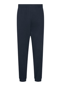 EA7 Emporio Armani Spodnie dresowe 7M000154 AF10432 UB102 Granatowy Regular Fit ze sklepu MODIVO w kategorii Spodnie męskie - zdjęcie 181075388