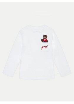 Guess Bluzka N4BI06 I3Z14 Biały Regular Fit ze sklepu MODIVO w kategorii Bluzki dziewczęce - zdjęcie 181075947