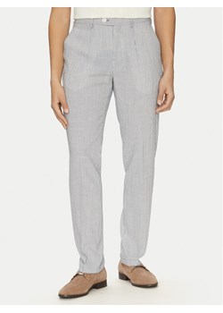 Marciano Guess Chinosy 5GHB17 2314Z Błękitny Slim Fit ze sklepu MODIVO w kategorii Spodnie męskie - zdjęcie 181076239