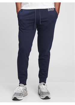 Gap Spodnie dresowe 500382-03 Granatowy Regular Fit ze sklepu MODIVO w kategorii Spodnie męskie - zdjęcie 181076705