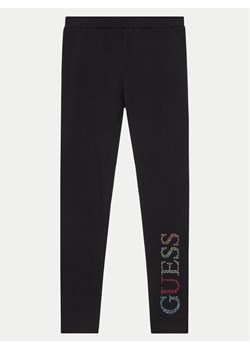 Guess Legginsy J4GB10 J1314 Czarny Regular Fit ze sklepu MODIVO w kategorii Spodnie dziewczęce - zdjęcie 181077299