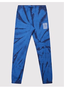 Vans Spodnie dresowe Tie Dye VN00002K Niebieski Regular Fit ze sklepu MODIVO w kategorii Spodnie chłopięce - zdjęcie 181077455