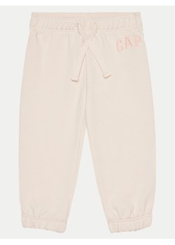 Gap Spodnie dresowe 876617-01 Różowy Regular Fit ze sklepu MODIVO w kategorii Spodnie i półśpiochy - zdjęcie 181077798