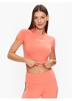 Guess Top V3RP16 KABR0 Pomarańczowy Slim Fit ze sklepu MODIVO w kategorii Bluzki damskie - zdjęcie 181078335