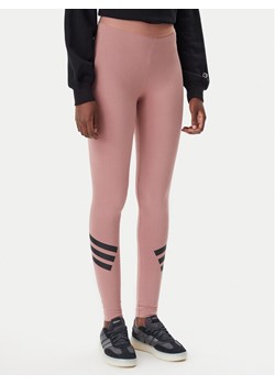 adidas Legginsy Future Icons 3-Stripes JE0223 Różowy Slim Fit ze sklepu MODIVO w kategorii Spodnie damskie - zdjęcie 181079257