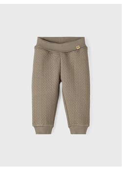 NAME IT Spodnie dresowe 13206940 Beżowy Regular Fit ze sklepu MODIVO w kategorii Spodnie i półśpiochy - zdjęcie 181079468
