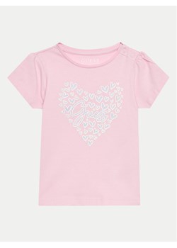 Guess T-Shirt A4GI01 K6YW4 Różowy Regular Fit ze sklepu MODIVO w kategorii Bluzki dziewczęce - zdjęcie 181080309