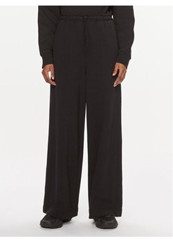 Calvin Klein Performance Spodnie dresowe 00GWS3P600 Czarny Wide Leg ze sklepu MODIVO w kategorii Spodnie damskie - zdjęcie 181081258