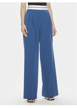 Hugo Spodnie materiałowe Hasiya 50505370 Niebieski Relaxed Fit ze sklepu MODIVO w kategorii Spodnie damskie - zdjęcie 181081949