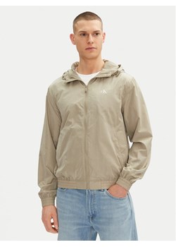 Calvin Klein Jeans Wiatrówka J30J327254 Szary Regular Fit ze sklepu MODIVO w kategorii Kurtki męskie - zdjęcie 181082286