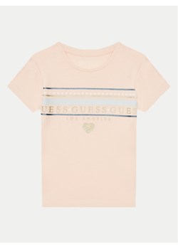 Guess T-Shirt K5GI00 K6YW4 Różowy Regular Fit ze sklepu MODIVO w kategorii Bluzki dziewczęce - zdjęcie 181084077