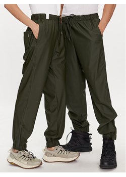 Rains Spodnie przeciwdeszczowe Rain Pants Regular W3 18560 Zielony Regular Fit ze sklepu MODIVO w kategorii Spodnie damskie - zdjęcie 181087638