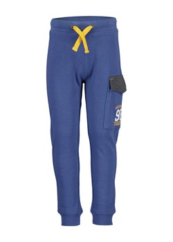 Blue Seven Spodnie dresowe 824607 X Niebieski Regular Fit ze sklepu MODIVO w kategorii Spodnie dziewczęce - zdjęcie 181087875