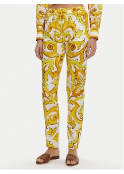 Dolce&Gabbana Spodnie materiałowe FTC4PT HH5EA Żółty Regular Fit ze sklepu MODIVO w kategorii Spodnie damskie - zdjęcie 181089179
