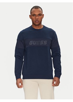 Guess Bluza Z5GQ09 K6ZS1 Granatowy Regular Fit ze sklepu MODIVO w kategorii Bluzy męskie - zdjęcie 181089595