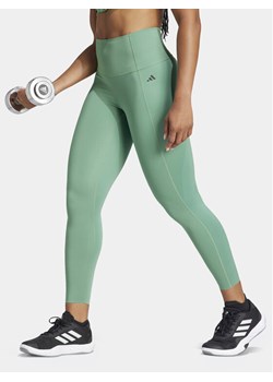 adidas Legginsy Optime Power IT6747 Zielony Slim Fit ze sklepu MODIVO w kategorii Spodnie damskie - zdjęcie 181089607