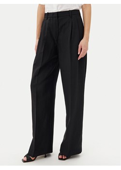 Tommy Hilfiger Spodnie materiałowe WW0WW45460 Czarny Relaxed Fit ze sklepu MODIVO w kategorii Spodnie damskie - zdjęcie 181089669