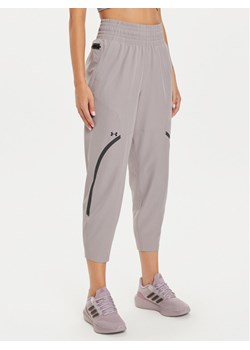 Under Armour Spodnie outdoor UA Unstoppable 1382741 Beżowy Loose Fit ze sklepu MODIVO w kategorii Spodnie damskie - zdjęcie 181090437