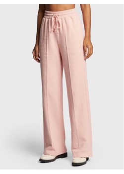 American Vintage Spodnie dresowe Ellan ELLA05AH22 Różowy Loose Fit ze sklepu MODIVO w kategorii Spodnie damskie - zdjęcie 181090679
