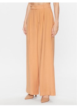 DKNY Spodnie palazzo P3EK8Q84 Pomarańczowy Regular Fit ze sklepu MODIVO w kategorii Spodnie damskie - zdjęcie 181091247