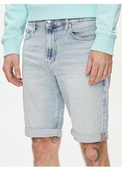 Calvin Klein Jeans Szorty jeansowe J30J324871 Niebieski Slim Fit ze sklepu MODIVO w kategorii Spodenki męskie - zdjęcie 181091688