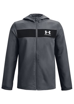 Under Armour Kurtka przejściowa UA SPORTSTYLE WINDBREAKER 1370183 Szary Regular Fit ze sklepu MODIVO w kategorii Kurtki chłopięce - zdjęcie 181092985