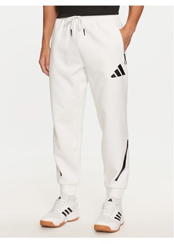 adidas Spodnie dresowe Z.N.E. JF2449 Biały Regular Fit ze sklepu MODIVO w kategorii Spodnie męskie - zdjęcie 181093217