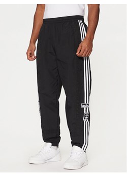 adidas Spodnie dresowe Adibreak JD4257 Czarny Loose Fit ze sklepu MODIVO w kategorii Spodnie męskie - zdjęcie 181094599