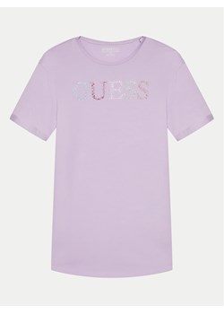Guess T-Shirt J4GI38 J1314 Fioletowy Regular Fit ze sklepu MODIVO w kategorii Bluzki dziewczęce - zdjęcie 181095385