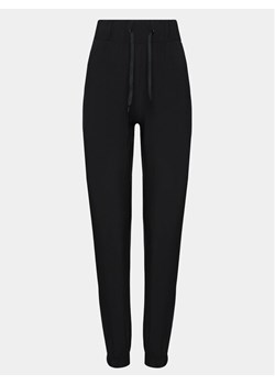 Athlecia Spodnie dresowe Austberg W Training Pants E181382 Czarny Regular Fit ze sklepu MODIVO w kategorii Spodnie męskie - zdjęcie 181097576