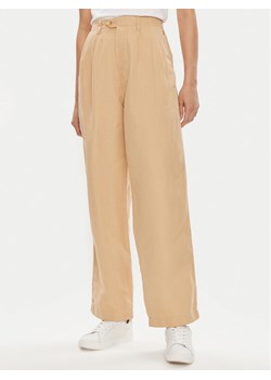 Tommy Hilfiger Spodnie materiałowe WW0WW41355 Beżowy Relaxed Fit ze sklepu MODIVO w kategorii Spodnie damskie - zdjęcie 181097827
