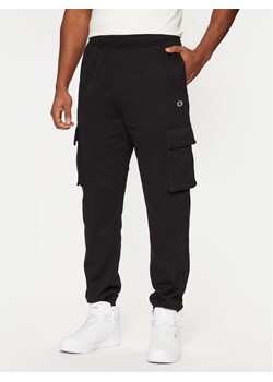 Champion Spodnie dresowe 220298 Czarny Standard Fit ze sklepu MODIVO w kategorii Spodnie męskie - zdjęcie 181099385
