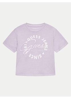 Guess T-Shirt J4GI30 K8HM4 Fioletowy Boxy Fit - id: 0000303513160 - marki Guess - 181102156 Guess T-Shirt J4GI30 K8HM4 Fioletowy Boxy Fit ze sklepu MODIVO w kategorii Bluzki dziewczęce - zdjęcie 181102156