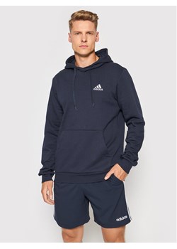 adidas Bluza FeelCozy Hoodie H12216 Granatowy Regular Fit ze sklepu MODIVO w kategorii Bluzy męskie - zdjęcie 181102499