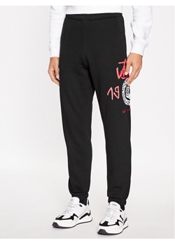 Just Cavalli Spodnie dresowe 75OAAI01 Czarny Regular Fit ze sklepu MODIVO w kategorii Spodnie męskie - zdjęcie 181103609