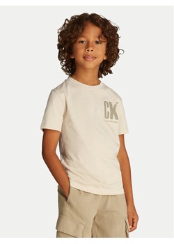 Calvin Klein Jeans T-Shirt Surf Graphic IB0IB02447 Beżowy Regular Fit ze sklepu MODIVO w kategorii T-shirty chłopięce - zdjęcie 181104075