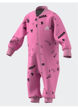 adidas Kombinezon IA1558 Różowy Regular Fit ze sklepu MODIVO w kategorii Kombinezony dziewczęce - zdjęcie 181106698