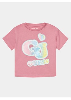 Guess T-Shirt K4RI28 K8HM0 Różowy Boxy Fit ze sklepu MODIVO w kategorii Bluzki dziewczęce - zdjęcie 181107929