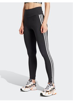 adidas Legginsy 3-Stripes IP2968 Czarny Slim Fit ze sklepu MODIVO w kategorii Spodnie damskie - zdjęcie 181108635