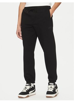 Vans Spodnie dresowe Core Basic VN000HQ2 Czarny Loose Fit ze sklepu MODIVO w kategorii Spodnie męskie - zdjęcie 181108647