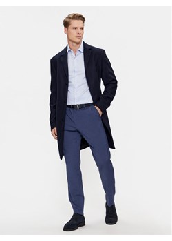 Calvin Klein Płaszcz wełniany K10K110462 Granatowy Regular Fit ze sklepu MODIVO w kategorii Płaszcze męskie - zdjęcie 181108865
