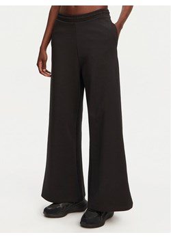 HUGO Spodnie dresowe Nalosia 50530447 Czarny Loose Fit ze sklepu MODIVO w kategorii Spodnie damskie - zdjęcie 181109015