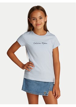 Calvin Klein Jeans T-Shirt Script Logo IG0IG02857 Błękitny Slim Fit ze sklepu MODIVO w kategorii Bluzki dziewczęce - zdjęcie 181110028