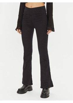 Gina Tricot Legginsy 23067 Czarny Flare Fit ze sklepu MODIVO w kategorii Spodnie damskie - zdjęcie 181110108