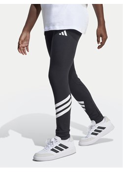adidas Legginsy Future Icons 3-Stripes JC7567 Czarny Slim Fit ze sklepu MODIVO w kategorii Spodnie dziewczęce - zdjęcie 181111357
