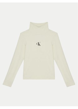 Calvin Klein Jeans Golf IG0IG02808 Beżowy Regular Fit ze sklepu MODIVO w kategorii T-shirty chłopięce - zdjęcie 181111897