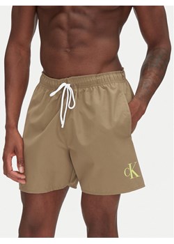 Calvin Klein Swimwear Szorty kąpielowe KM0KM01101 Khaki Regular Fit ze sklepu MODIVO w kategorii Kąpielówki - zdjęcie 181112799