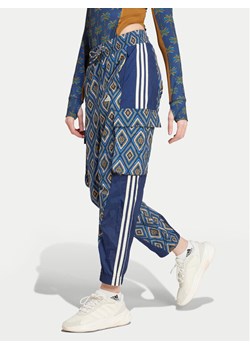 adidas Spodnie dresowe FARM Rio Premium IV9760 Granatowy Loose Fit ze sklepu MODIVO w kategorii Spodnie damskie - zdjęcie 181113439